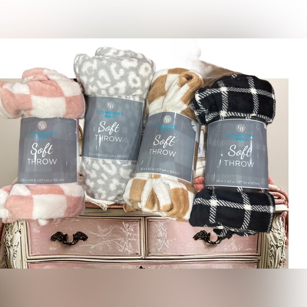 Brand new in original packaging .  Soft Throw  you can buy each for $15